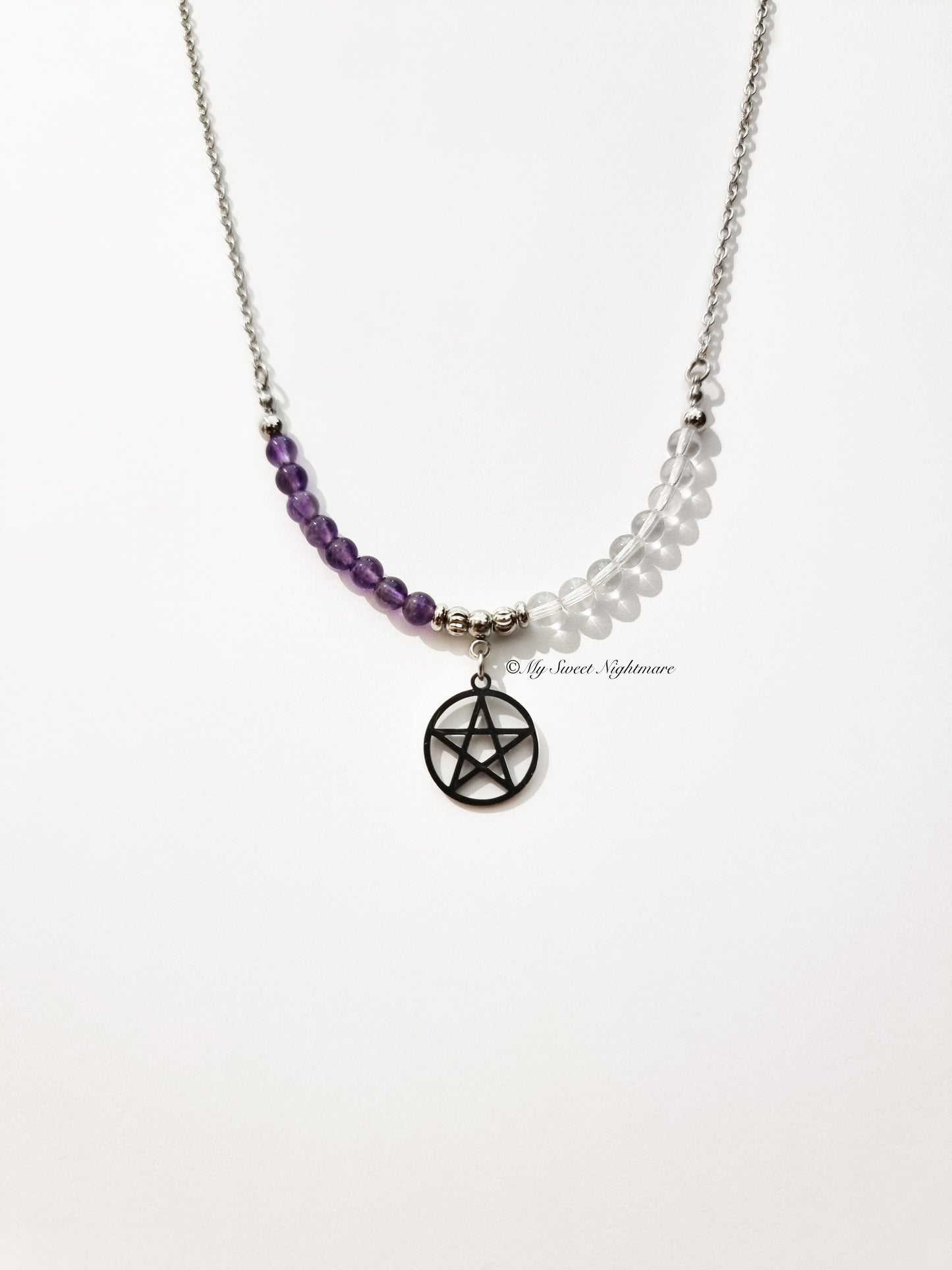 Necklace with pentagram, amethyst and rock crystal