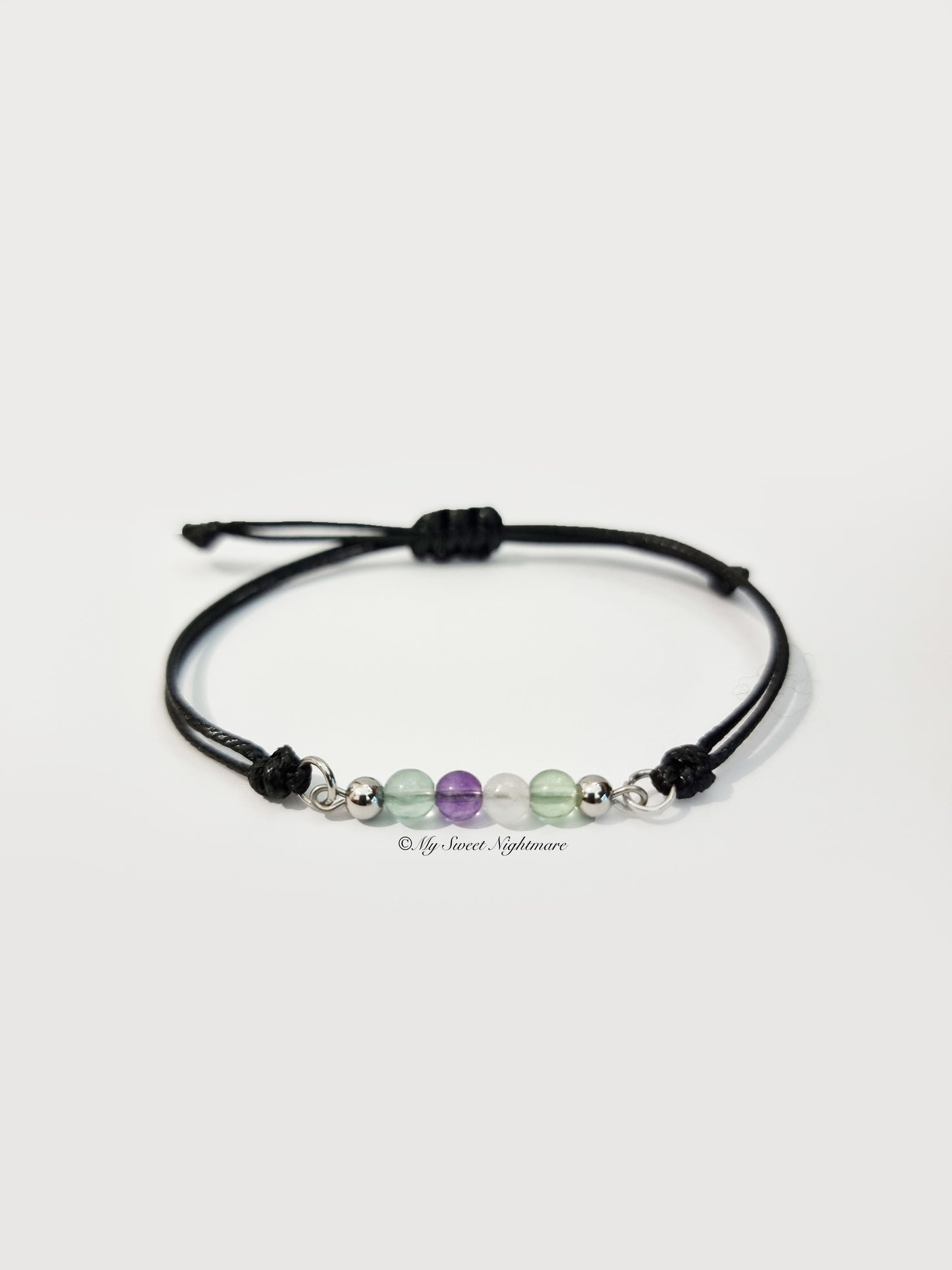 Adjustable bracelet in natural Fluorite and black cord