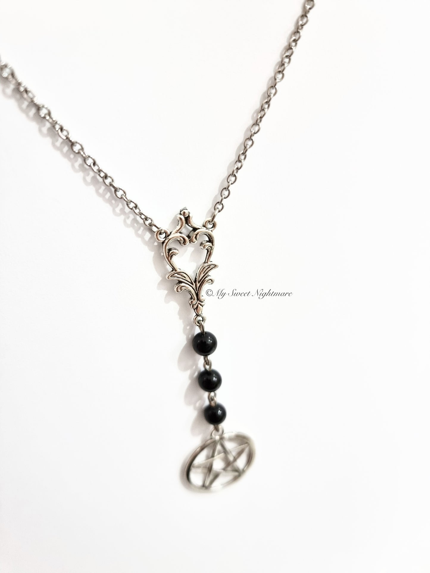 Collana con pentacolo e tormalina nera