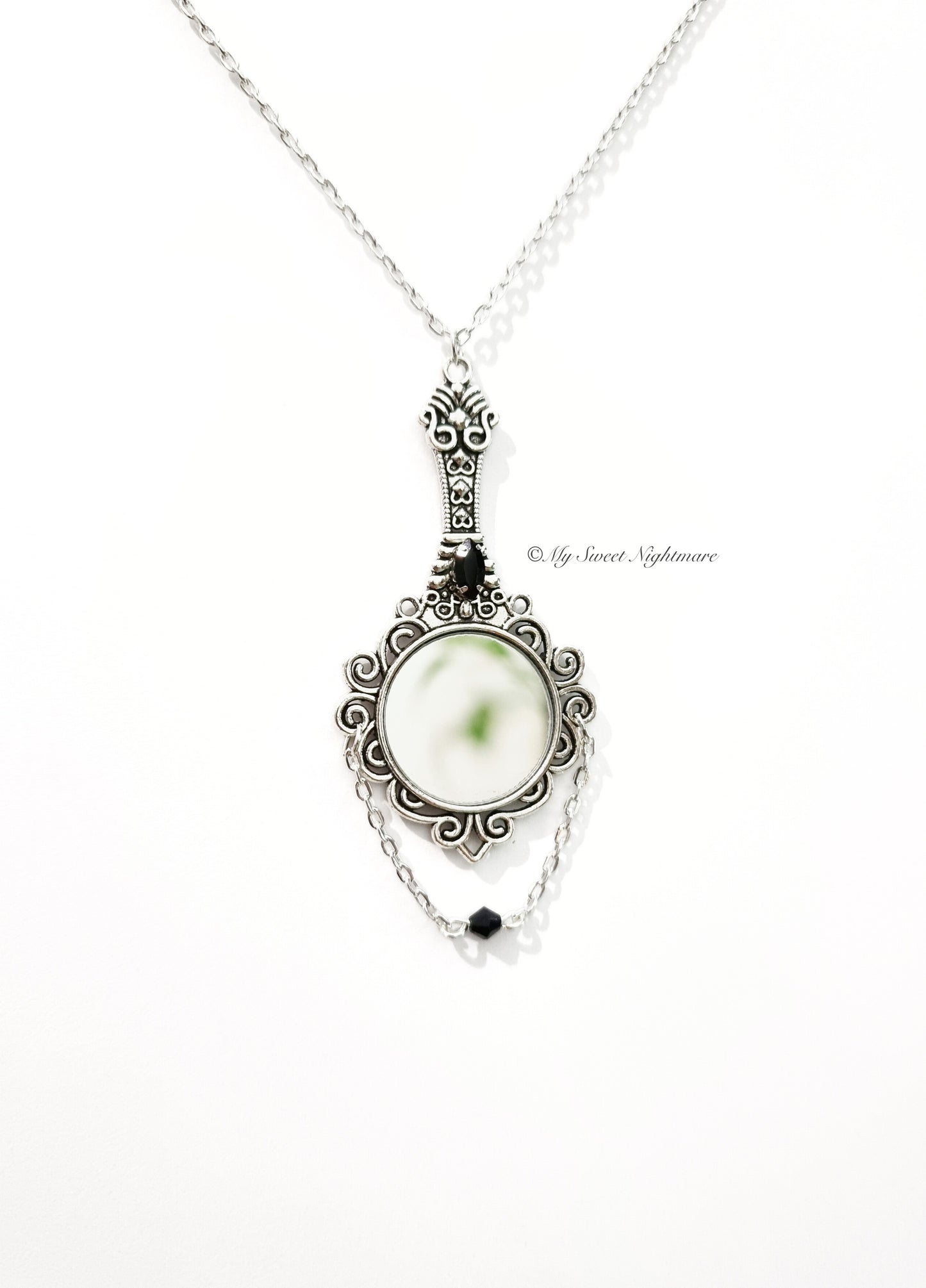 Collana con specchio e cristalli neri