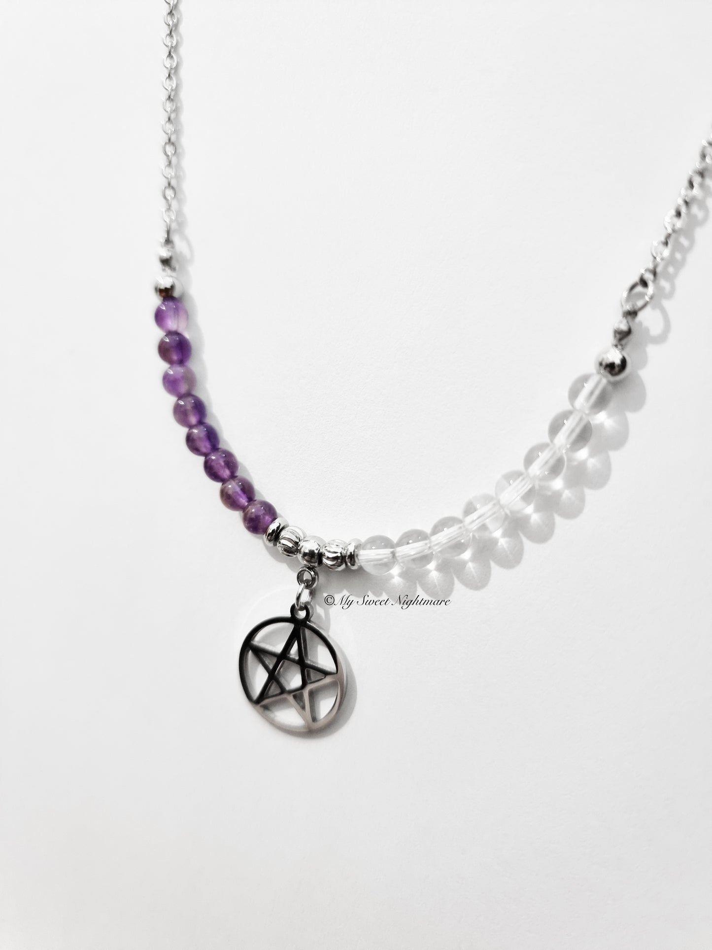 Necklace with pentagram, amethyst and rock crystal