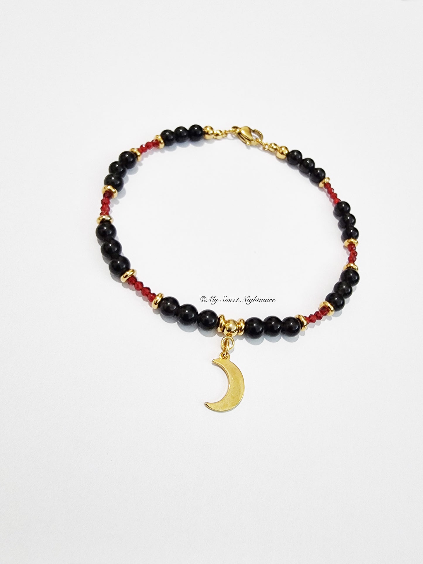 Bracelet with Golden Obsidian, crescent moon and red crystals