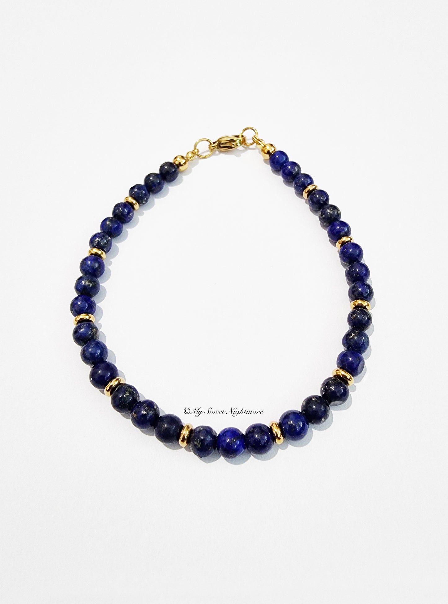 Bracelet in AA quality Lapis Lazuli and gold steel