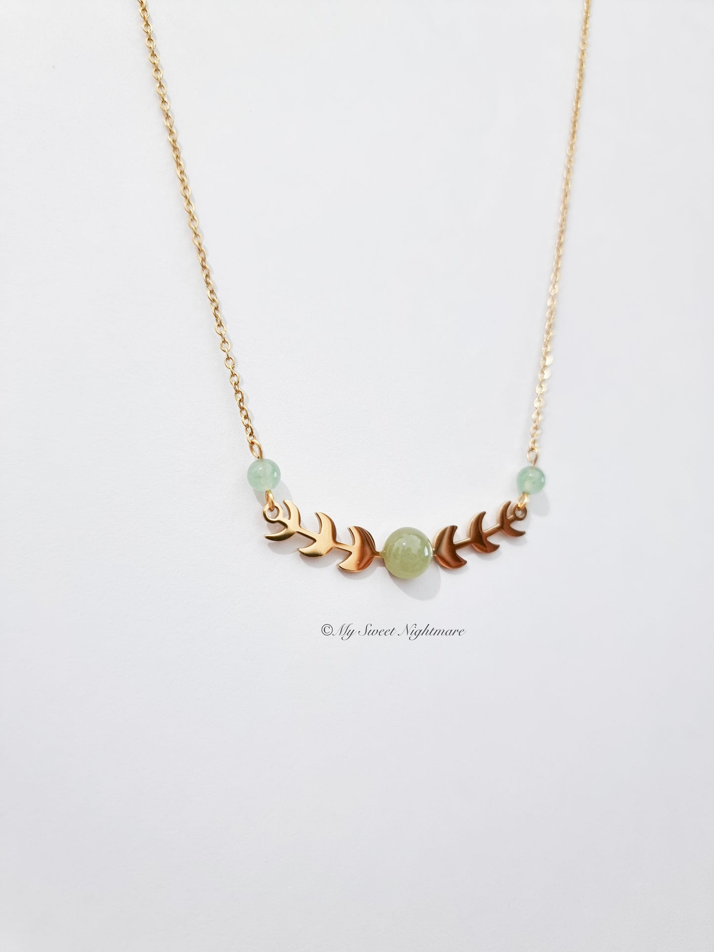 Moon phases in gold steel with green aventurine