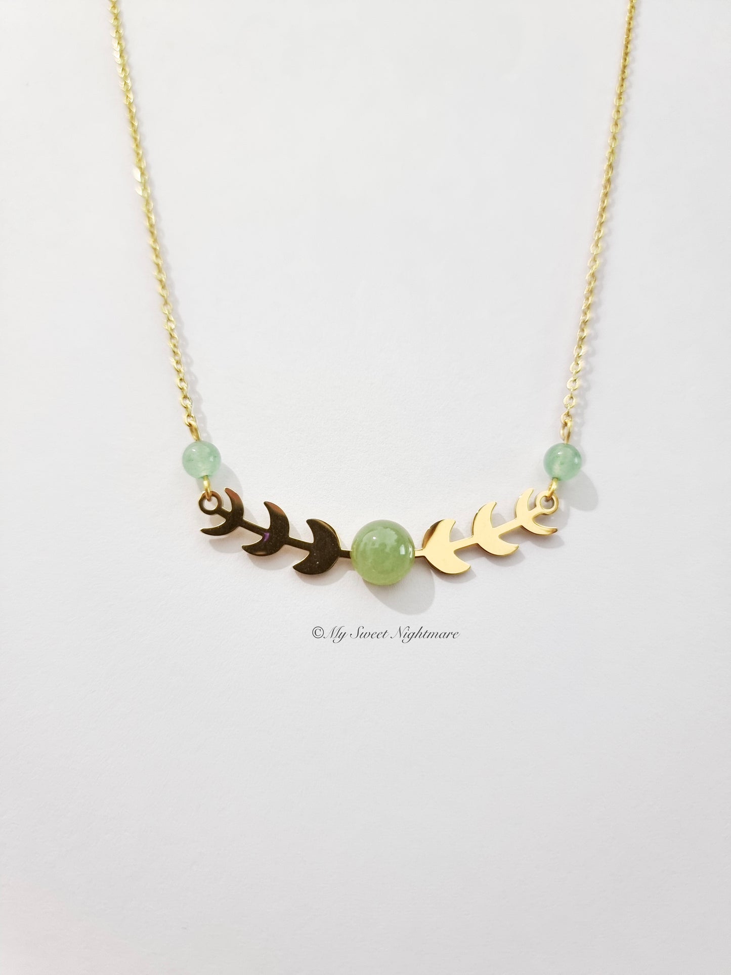 Moon phases in gold steel with green aventurine