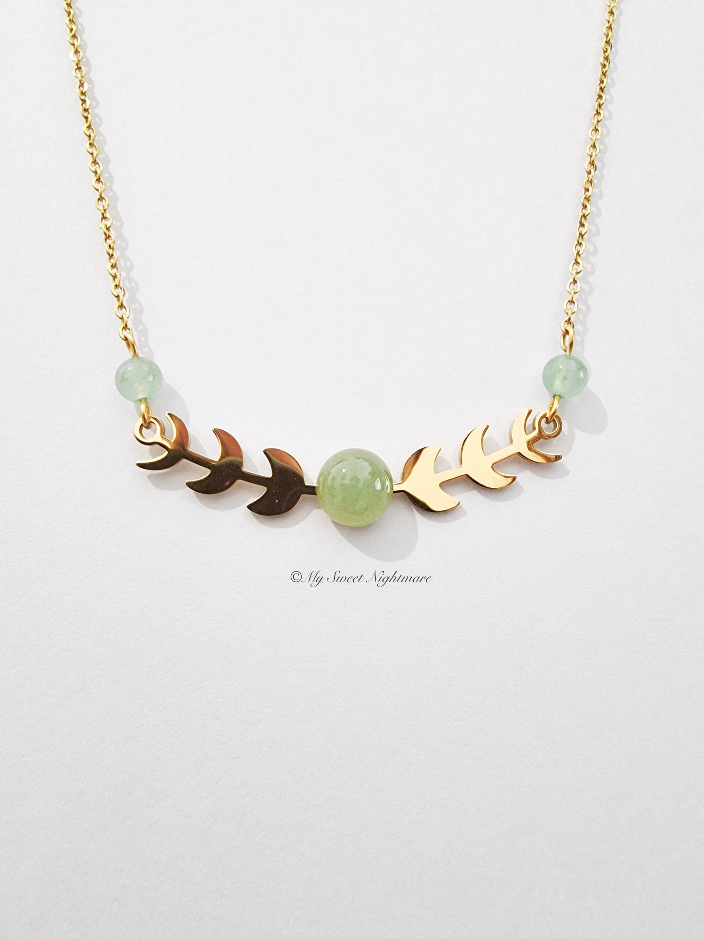 Moon phases in gold steel with green aventurine