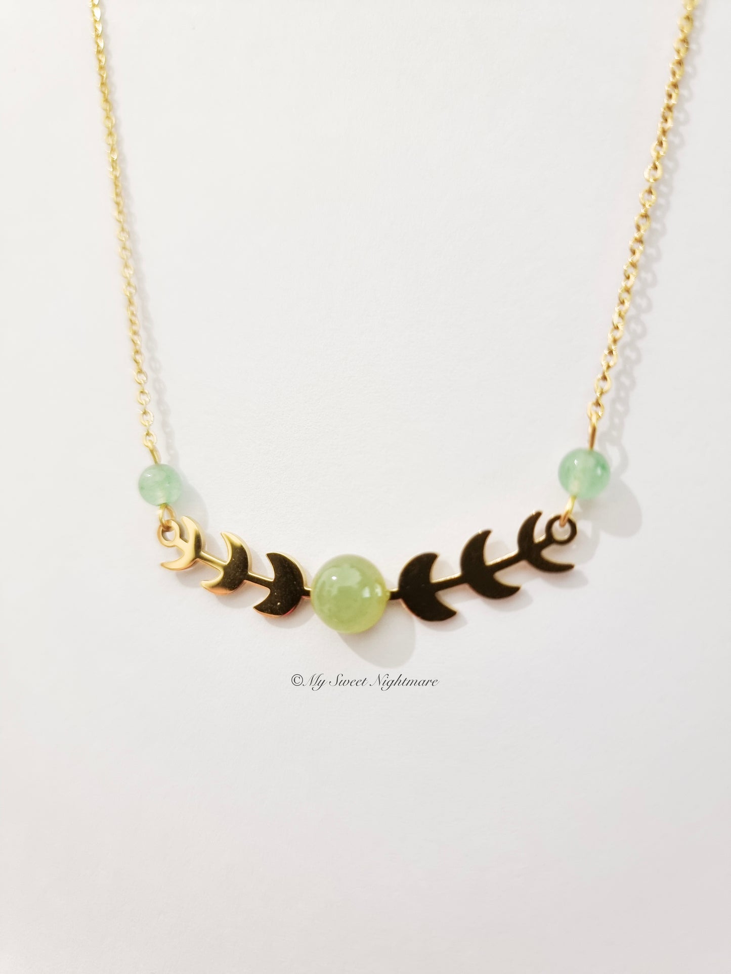 Moon phases in gold steel with green aventurine
