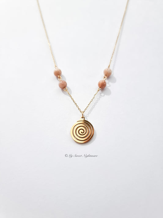 Necklace with golden spiral in steel and Sunstone