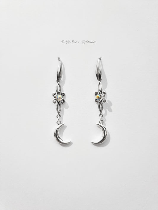Orecchini pendenti in stile celtico con lune