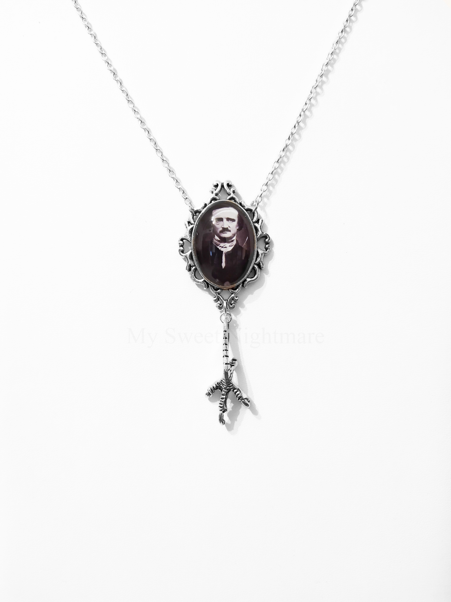 Collana con Edgar Allan Poe e zampa di corvo