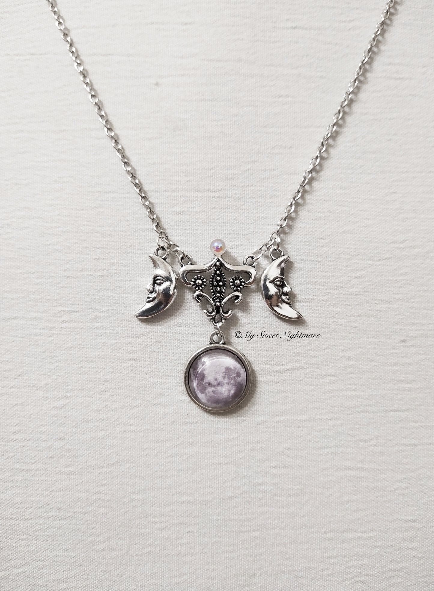 Collana Con triplice luna